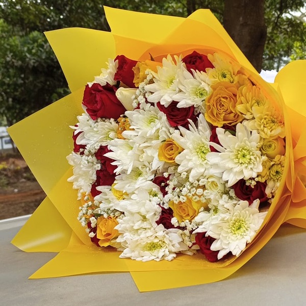 Yellow wrapped flower bouquet